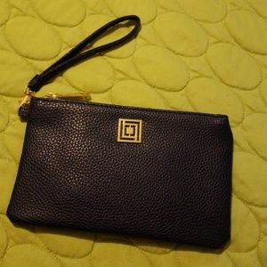 Liz Claiborne Navy wristlet with charging pack